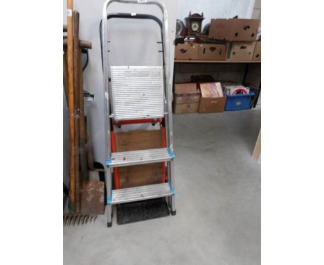 A sack truck and a step ladder