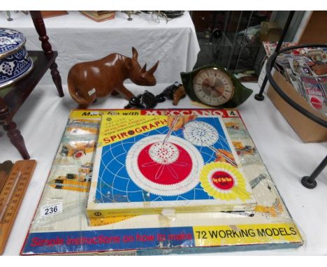 A mixed lot including Meccano, Spirograph, wooden Rhino, tortoises, clock