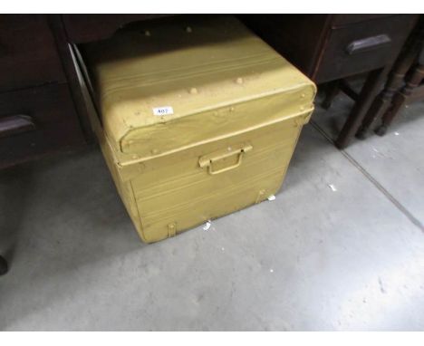 A large tin trunk
