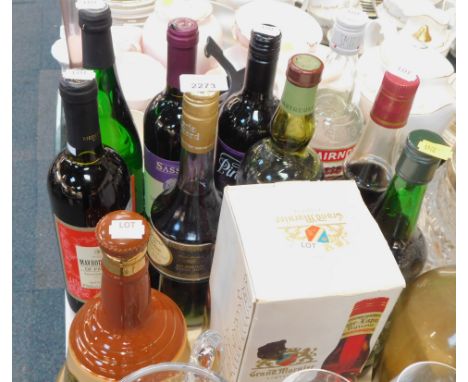 A group of alcohol, comprising of a Bells empty Scotch whisky decanter, various Morrison's red and white wines, Smirnoff Vodk