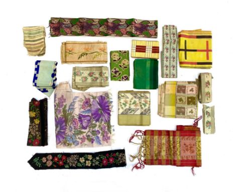 A quantity of late 19th/early 20th century silk trim, to include black silk with floral embroidered design; 19th century red 