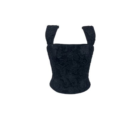 An Anouska Hempel black structured top in unusual raised abstract lace, zip to back, boned structure, 29" waist, 35" chest