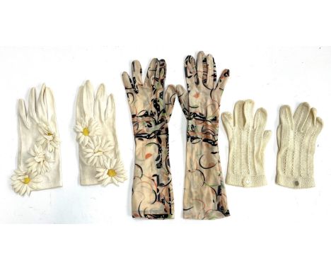 Three pairs of ladies gloves, to include a pair of Tallulla New York gloves with daisy additions, a light pair of patterned l