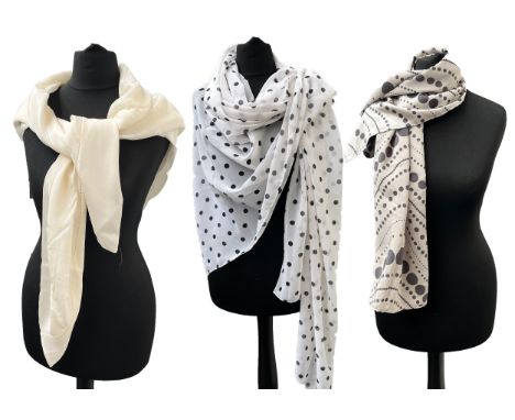 Three silk scarves, to include a polka dot scarf by Neisha Crosland, a large rectangular silk chiffon polkadot scarf, and a c