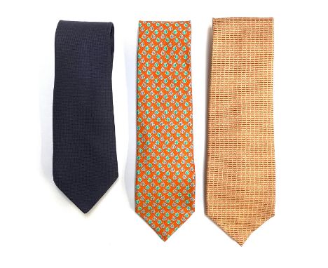 A navy silk ties by Hermes, Paris; and two Bulgari ties