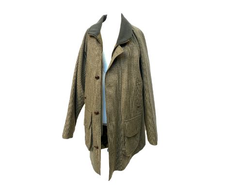 A wool jacket with quilted lining, by John Brockelhurst, size M 38/40