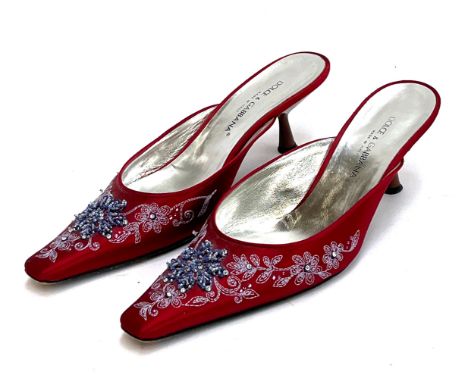 A pair of Dolce &amp; Gabbana slip on mules, red silk with purple embroidery and beading, kitten heels and pointed closed toe