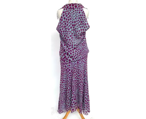 A silk Emanuel Ungaro two piece set, to include ruffle front top in blue and purple abstract design, with matching bias cut m