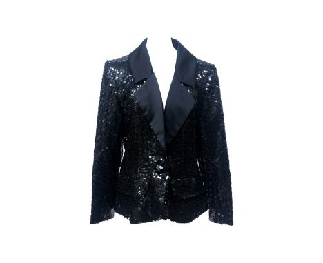 An Yves Saint Laurent black hand stitched sequin blazer with satin lapels, shoulder pads, and two flap pockets, singular butt