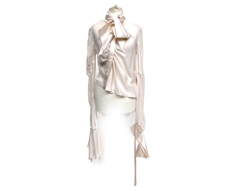 A silk Maria Grachvogel blouse, with gathered and ruched centre and sleeves, one flouncy long cuff, the other silk satin, wit