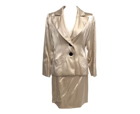 An Yves Saint Laurent champagne tone silk/wool blend skirt suit, ladies size 38, jacket with black buttons to front and cuff,