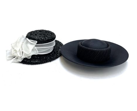 Two occasion hats, to include a woven hat with white ribbon, by Rachel Trevor Morgan, London, and a navy hat by Graham Smith