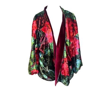 A mixed lot of colourful ladies clothing to include; printed velvet jacket, floral leather jacket, bold floral blouse with la