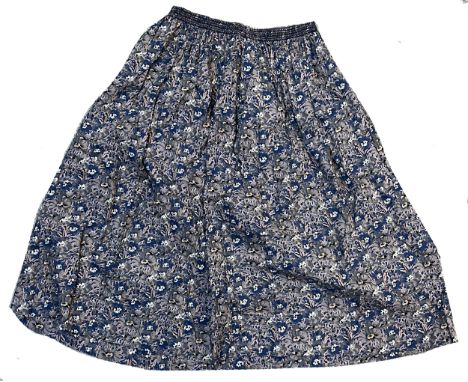 Seven Liberty Plus cotton skirts in a variety of floral and paisley prints with elasticated waists, in women's size M to L