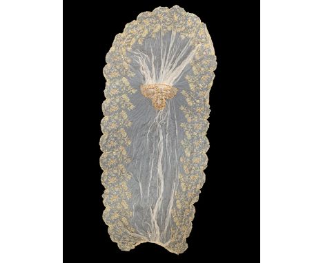 A c.1944 Sri Lankan lace train, weighted with claw set citrine paste, metallic thread floral embroidery with scalloped edge, 