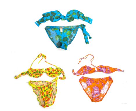 A lot of vintage bikinis, to include an Eres leaf print bikini, size 14, a crinkle yellow floral bikini, size M, an orange to