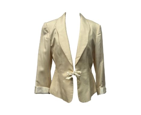 A Paddy Campbell cream silk jacket, with ribbon bow tie, ladies size 12