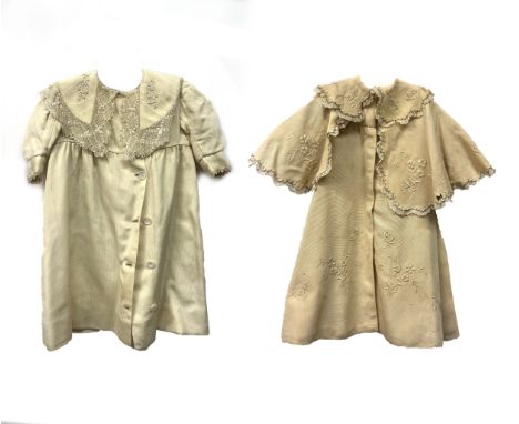 Two cream girls occasion dresses in ribbed material one with handmade lace collar and asymmetric button front, approx 25" che