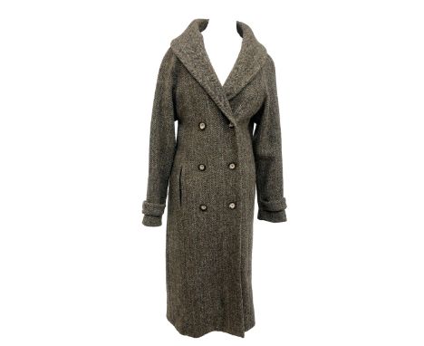 A wool tweed Brora coat, size 10, together with a Cesare Fabric sheepskin suede and shearling jacket, and a green wool overco