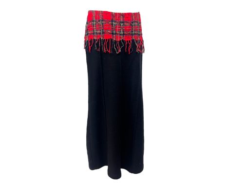 A Save the Queen long wool skirt with manipulated tartan yoke and fringed panel, red net lining, heavy black wool body, women