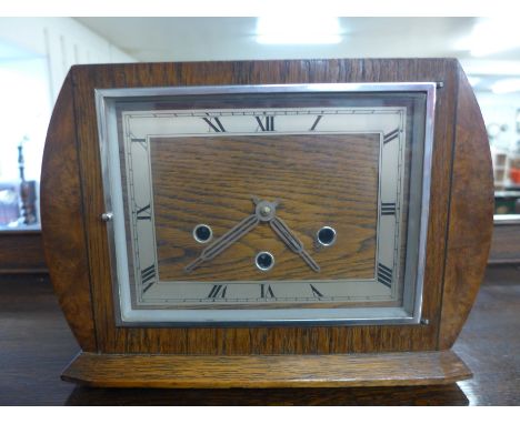 An Art Deco oak mantel clock