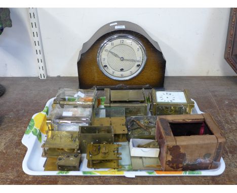 An oak mantel clock and carriage clock parts