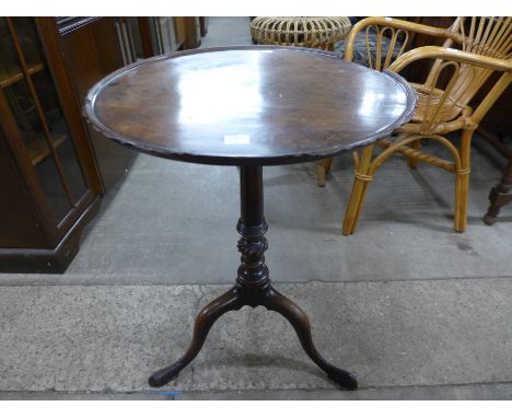 A Chippendale Revival mahogany circular tilt top tripod table