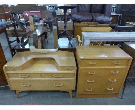 An E. Gomme, G-Plan light oak chest of drawers and dressing chest