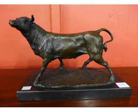 A French style bronze bull, manner of Antoine-Louis Barye, on black marble plinth