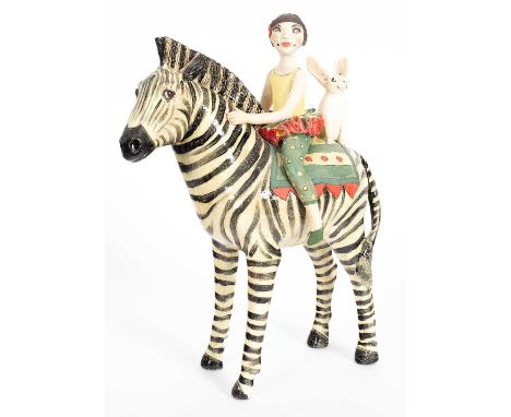 ARR A Marie Prett ceramic sculpture, girl acrobat on zebra, 35cm highProvenance: Dunkirk ManorIn good condition, no damage or