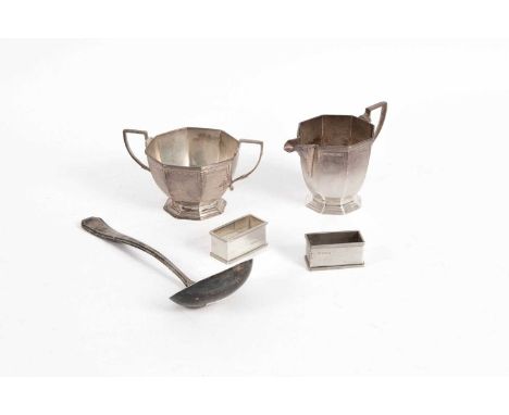 A small group of Art Deco silver, comprising a sugar basin and jug, Mappin &amp; Webb, Sheffield 1932, a ladle, Sheffield 193
