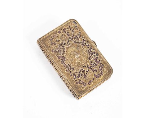 A Continental silver gilt Bible cover, import marks W M, London 1896, containing a Bible, the covers decorated with Biblical 