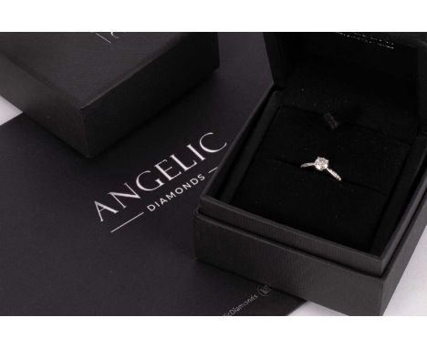An 18K white gold diamond solitaire ring, with side stones, from Angelic diamonds with valuation certificate and GIE diamond 