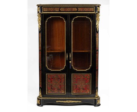 A French ebonised and Boulle work, gilt metal mounted display cabinet with two cartouche glazed and faux tortoiseshell and br