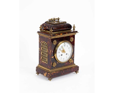 A French tortoiseshell and gilt metal mounted mantel clock, with enamel Arabic dial, the Marti movement striking on a gong, w