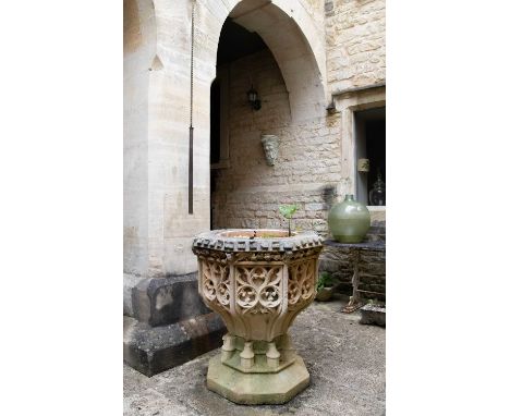 Viewing and collection by appointment for this lotA Victorian carved stone font of Gothic design the octagonal top with a cir