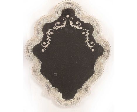 A Venetian style wall mirror, 52cm high x 40cm wide and a pair of Victorian wall-mounted mirror-backed yellow glass posy hold