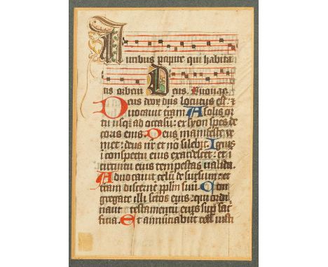 An illuminated manuscript missal leaf, with text in red, blue and black ink on vellum, 16cm x 12cmFramed and glazed. There is