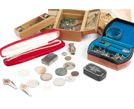 A quantity of costume jewellery including silver cufflinks, marcasite, E.P.N.S. rattle of teddy bear form, coins, an Iraqi ni