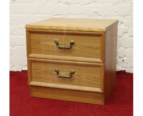 A G-plan light oak two drawer bedside cabinet.