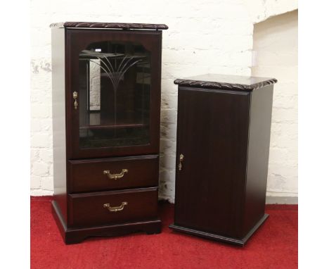 A carved mahogany glass front hi fi cabinet over two drawers along with a matching rotary C.D storage unit by maker John E Co