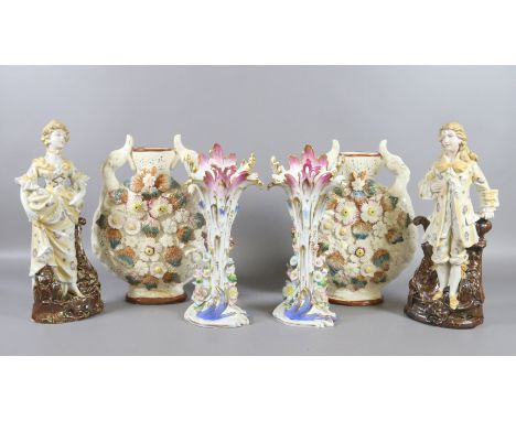 A collection of antique ceramic vases and figurines to include a pair of bottle vases with applied decoration and lizard form
