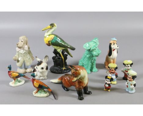 A collection of pottery animal figures including Goebel rabbit, Royal Dux dog, Sylvac dog and Walt Disney figures, etc.