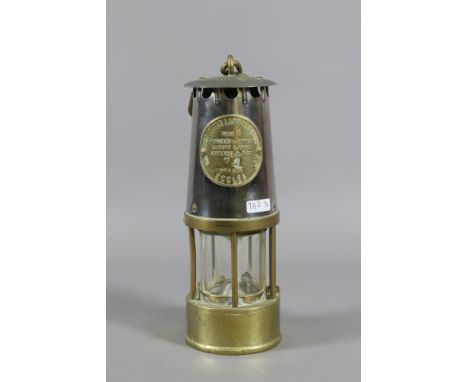 A brass and chrome Eccles type 6 miners safety lamp.