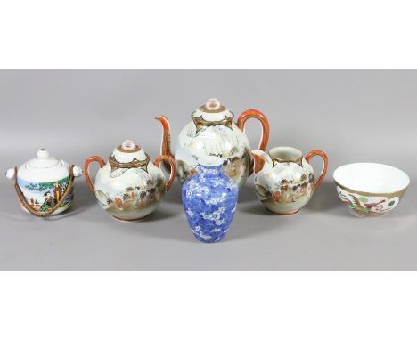 A Japanese Kutani eggshell porcelain three part tea service, a blue and white vase, a Japanese bowl and a lidded sugar bowl.