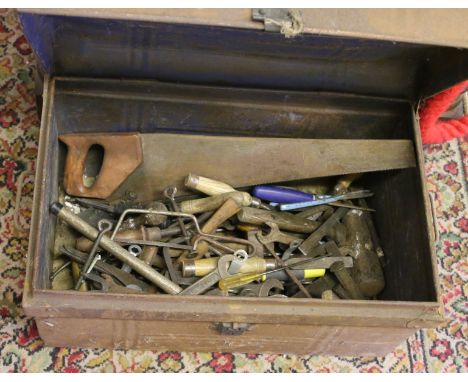 Tin trunk and assorted tools.