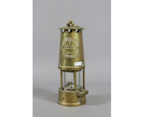 An Eccles type six brass miners safety lamp.