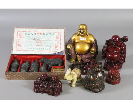 A collection of oriental composite models of Buddha along with  cased terracotta model army figures.