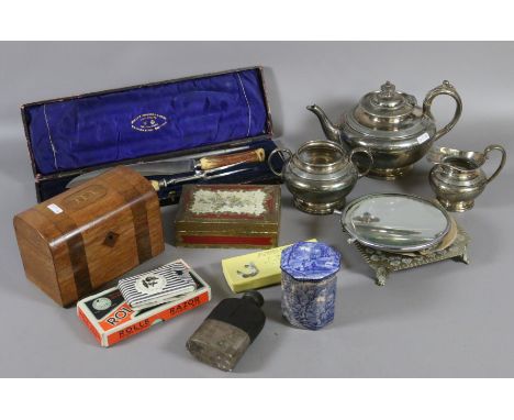 A collection of metalwares and wooden items to include tea caddy, silver plated three part dressing table set, cased carving 