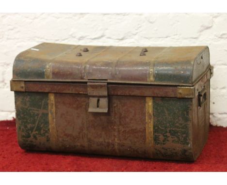 A painted dome top trunk.